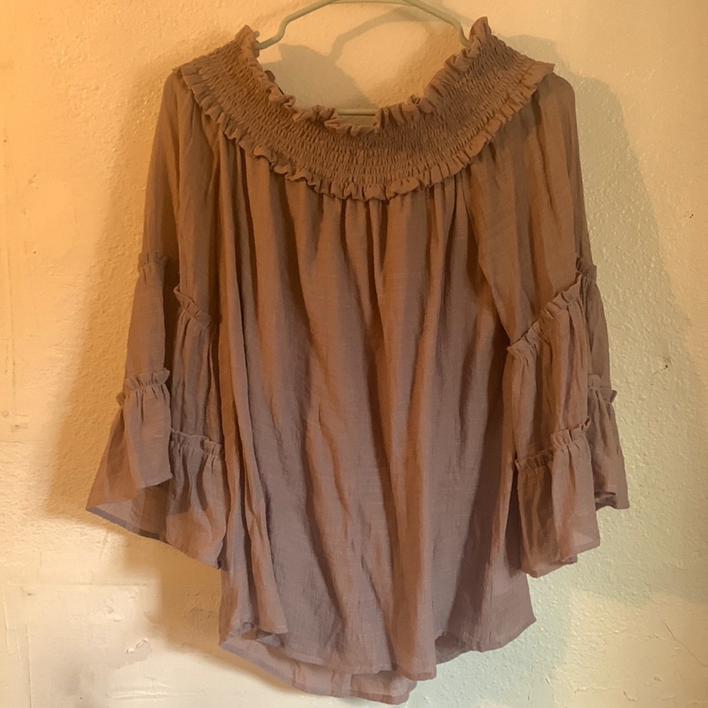 Never worn off the shoulder top. New without tags.